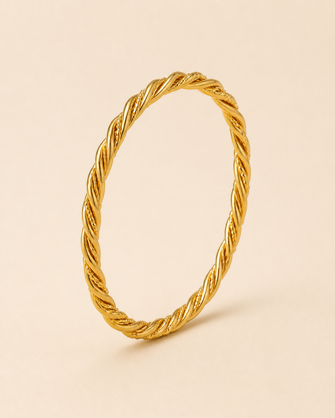 Layali Interlaced Bangle – Main product image Layali Interlaced Bangle golden jewelry product view