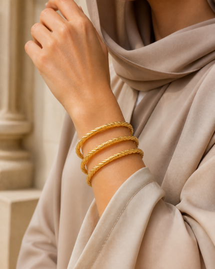 Layali Interlaced Bangle worn by an Arab woman