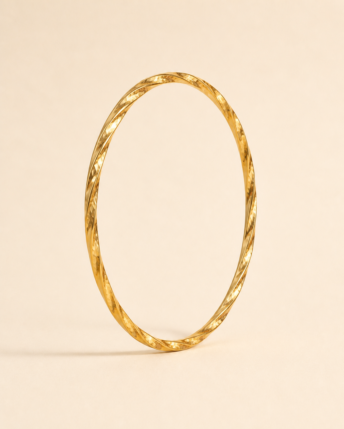 Sahra Faceted Bangle – Main product image Sahra Faceted Bangle golden jewelry product view