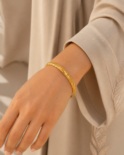 Warda Rose Relief Bangle worn by an Arab woman