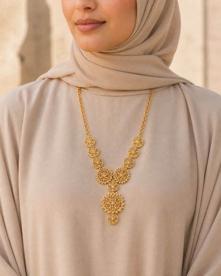 Shams Sunburst Necklace worn by an Arab woman